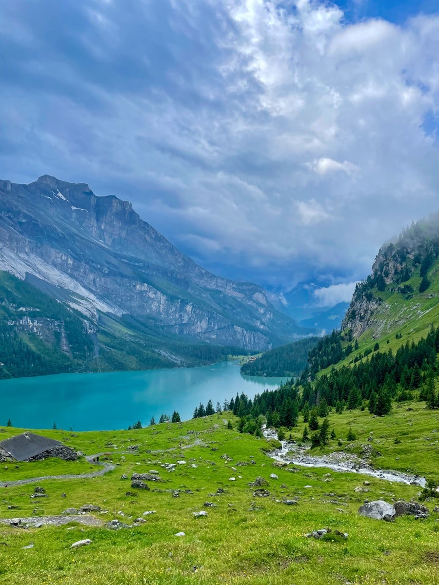 Scenic Kashmir alpine lake — trekkers rest at camp